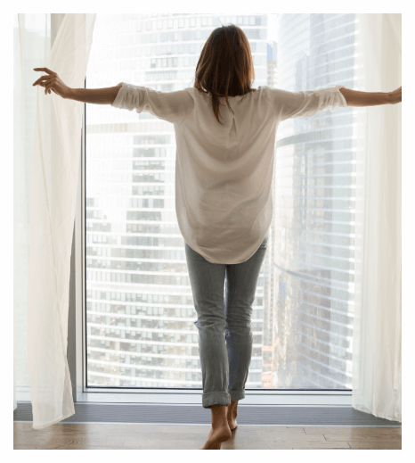 Non-diet nutrition therapy client looks out the window.